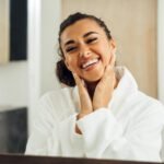 portrait-smiling-young-woman_1048944-27721042