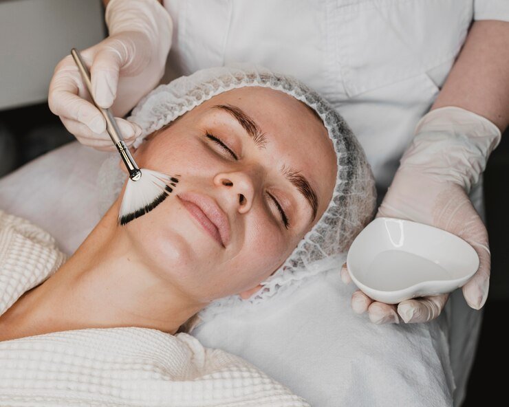 young-woman-getting-face-skin-treatment_23-2148825381