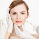 cosmetologists-hands-making-medical-botox-injections-beautiful-blonde-skin-lifting-facial-treatment-beauty-spa_176420-9347