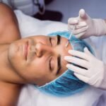 man-receiving-botox-injection-his-forehead_107420-65181